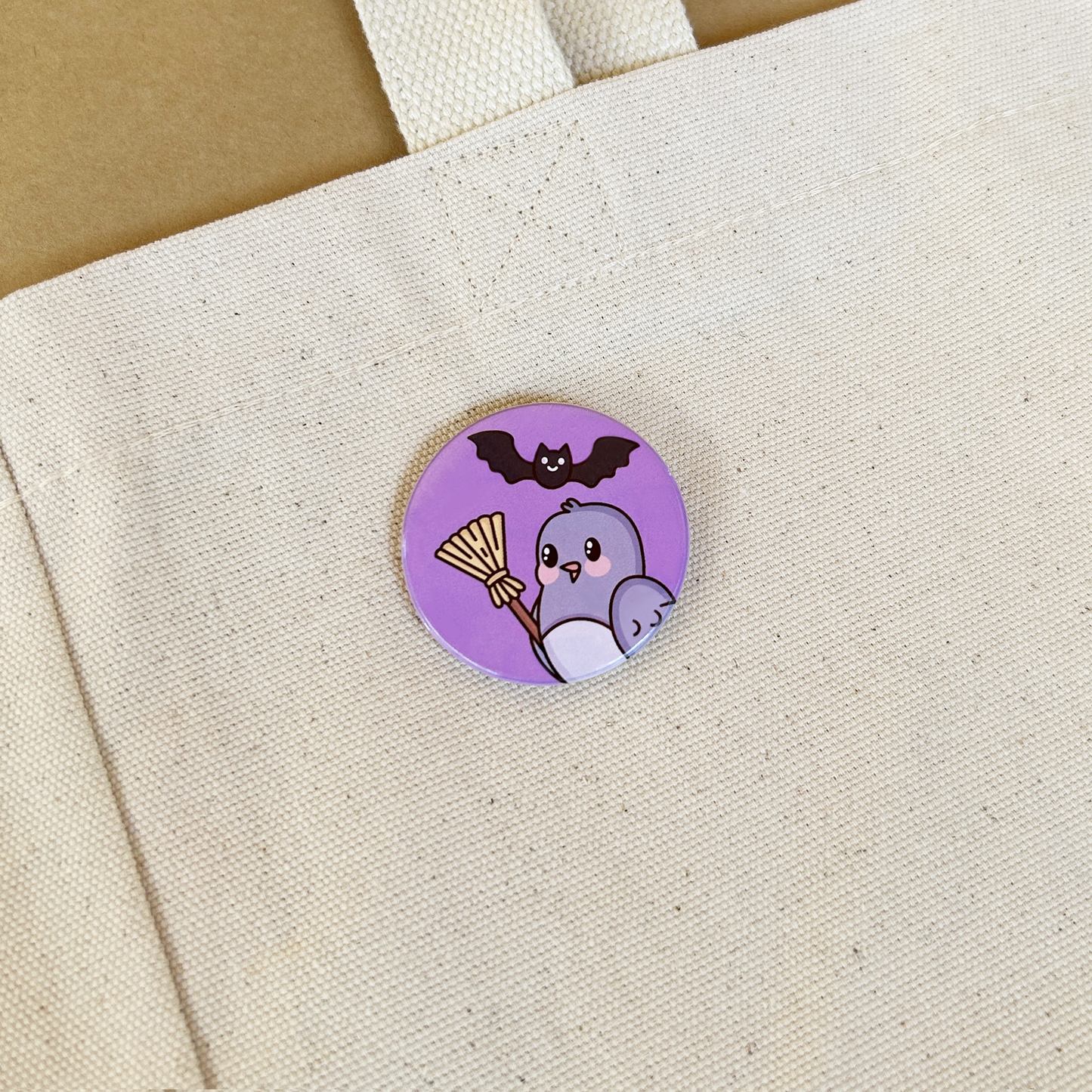 Birdie With Broom & Bat Button Pin